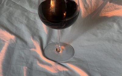 How can I properly clean and maintain my red wine glasses?