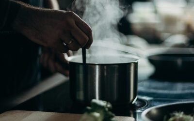 What are the benefits and drawbacks of boiling milk?