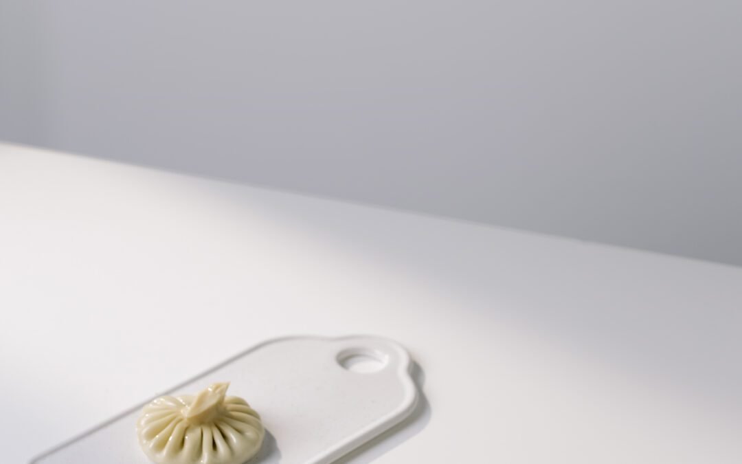 How is lassi traditionally served and consumed?