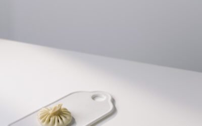 How is lassi traditionally served and consumed?